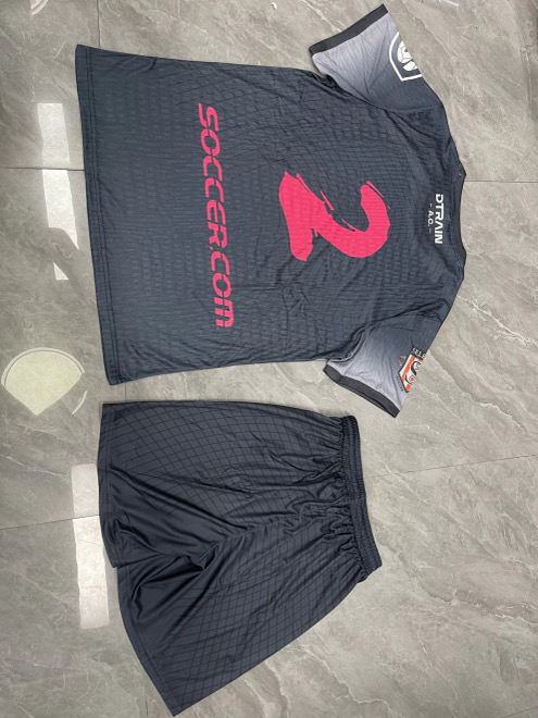 Finished navy kit with pink number and matching shorts