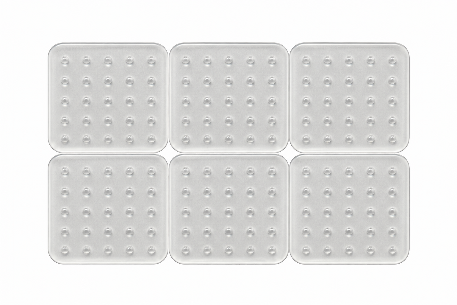 Grip Dots clear patch sheets covered in raised gel dots, arranged in a grid